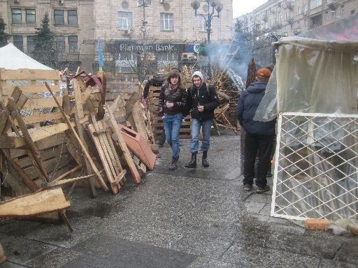 A couple walking through Maidan